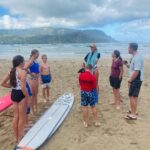 Bethany Hamilton Instagram - Stoked to hang with Daxton, & his family, who WON the trip to HAWAII through our #OneArmChallenge 💪🏽 Surfed, brought him my new book Surfing Past Fear & Unstoppable my Doc and we caught some crabs and had a family hang session! 🤙🏽😃☀️ We all can Adapt and Daxton is doing just that with a fierce determination!!! Go Daxton!!!
