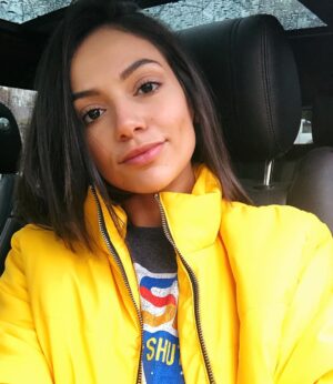 Bethany Mota Instagram - Rainy days make me feel like☺️💕🧚‍♂️ also, they apparently make me dress like I’m going to space ✌🏼