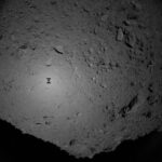 Bill Nye Instagram - Hayabusa II’s shadow falls on Asteroid Ryugu. By studying asteroids we learn more about the early Solar system and more about life itself. Space brings out the best in us.  It is amazing to be a human a living at this moment in the history of space exploration.