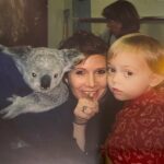 Billie Lourd Instagram - 💞🐨💞 People always ask me what stage of grief I’m in. And my answer is never simple. I’m in a different stage of grief in each moment of every day. My grief is a multi course meal with many complicated ingredients. An amuse bouche of bargaining followed by an anger appetizer with a side of depression, acceptance for the entree and of course a little denial for dessert. And that’s how grief should be - all things all at once - actually there is no “should” in grief - grief just is whatever it is for you and that is how it “should be”. Ps for anyone wondering why I’m posting this on the 26th it’s the 27th here down unda (aka Tomorrowland) so what better thing to post for my Momby’s Australian death anniversary (4 words I never thought I’d be putting next to each other?!?) than this picture of her and I with a koala!? ❤️sending my love to anyone out there who needs it 💕ℹ️ Ⓜ️ℹ️💲💲 🌱🅾️⛎ Ⓜ️🅾️Ⓜ️🅱️🌱💕