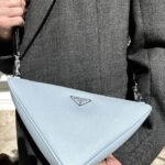 Blake Gray Instagram - Wearing my new #pradatriangle bag everywhere these days. Its convenience and 2-in-1 construction allows me to wear both bags together or separate depending on the occasion. @prada #ad