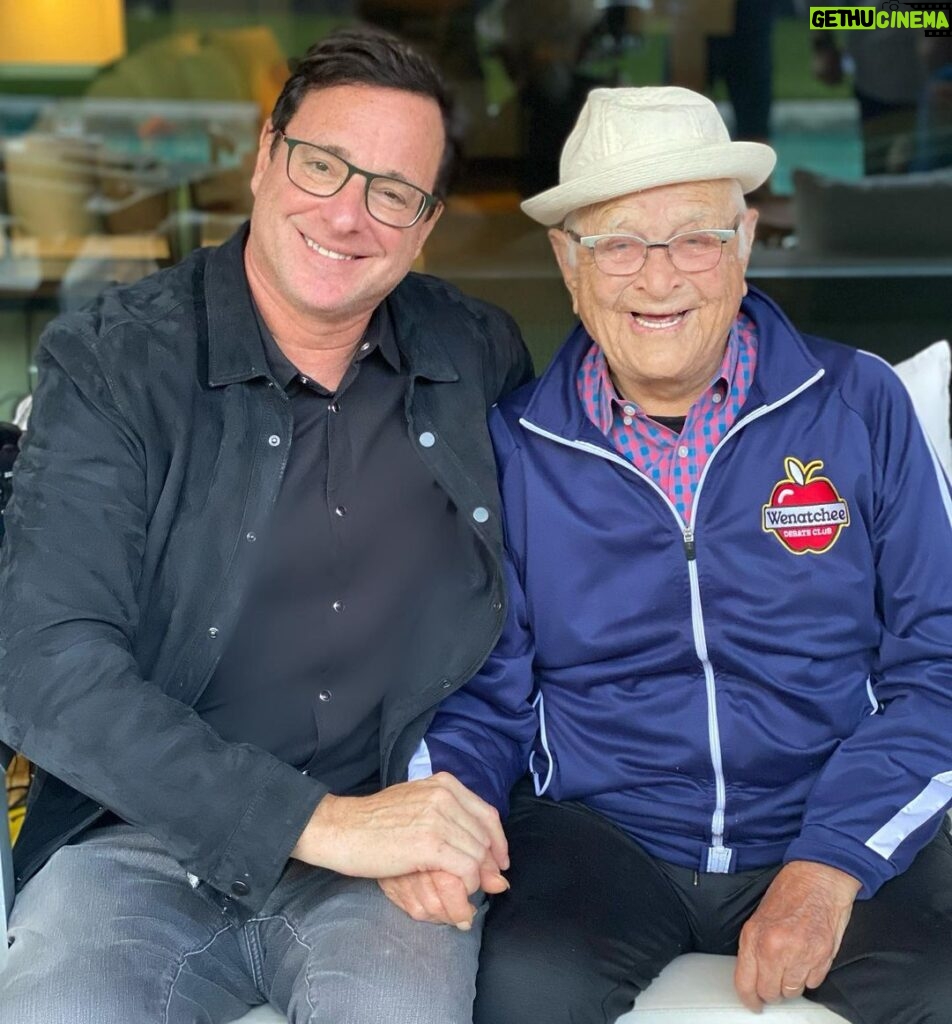 Bob Saget Instagram - HAPPY 99TH BIRTHDAY to the one and only @thenormanlear !!! In this life, if you’re lucky, if you have a handful of friends who mean so much to you. Norman Lear is of course an amazing human being in every way possible. Yes, he changed television forever with the smartest, most poignant and funniest shows ever seen— but everyone and everything he touches, he blesses with his clarity, brilliance, and love. And here he is touching ME! Norman, I treasure you as one of my dearest friends, and love you beyond words— and definitely beyond an Instagram post. Although this is a hell of a picture. Wishing you the happiest and healthiest of birthdays with your incredibly beautiful family. You are loved in the way I’m describing by so many people—Because you LOVE so many people. And to quote your beautiful proclamation, “I love you, and I don’t give a f*ck who knows it!” Happy Ninety-Nine Years Dear Amazing Norman!! ❤️💙