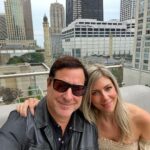 Bob Saget Instagram – My beautiful wife @eattravelrock (her legal name) and me having such a nice time as always on the rooftop @thepeninsulachi @zbarchicago – I’d like to thank the Peninsula for their always awesome service— and hairspray for allowing me to be photographed in the Windy City. @choosechicago The Peninsula Chicago