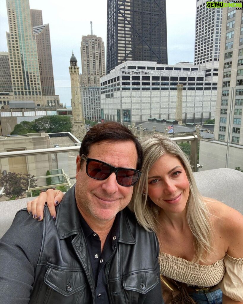 Bob Saget Instagram - My beautiful wife @eattravelrock (her legal name) and me having such a nice time as always on the rooftop @thepeninsulachi @zbarchicago - I’d like to thank the Peninsula for their always awesome service— and hairspray for allowing me to be photographed in the Windy City. @choosechicago The Peninsula Chicago