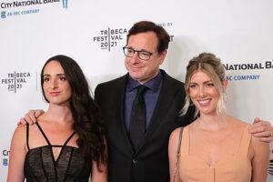 Bob Saget Instagram - Last night…With my wife, Kelly, and my daughter, Lara….So fantastic to be at the reopening of @radiocitymusichall last night for Dave Chappelle’s documentary which closes out the @Tribeca Film Festival. Only Dave could’ve done this great film about how he did his #DaveChappelleSummerCamp shows during Covid— Because we are blessed with only one Dave Chappelle.