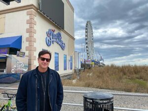 Bob Saget Instagram - Atlantic City. LOVED my two shows @hardrockhcac with @therealmikeyoung - And ironically, it was located right here – where I used to go to as a kid. Steel Pier. It’s hard to believe that when I came here at nine years old, staying every summer at my grandparents, who lived not far inland from this very spot, this pier did not end where it does today. Nor did it look like this. It was amazing. Sure, arcade games, bumper cars, but mainly major showrooms with the biggest acts. It’s now 1000 feet long with some amusement rides but it was 2000 feet long when I used to go to it— And, like I said,  it had the biggest names in show business performing. At nine years old I got to see the original Temptations and the original Four Tops on the same bill. My grandparents also took me to see Ricky Nelson there. I got to stand  on the side of the pier and watch a helicopter take Ricky Nelson away to his next destination. At the very end of the pier they used to have a diving horse. Thank God they stopped that tradition. But it was also at the end of that pier there was a ballroom where I stood, at 10 years old, next to a drummer who had a small trio— and people were dancing— but the room was pretty empty. That drummer was the legendary Gene Krupa, one of the best drummers who has ever lived. I remember him staring at this kid – me – 10 years old, realizing I was seeing something amazing— watching him play. Memories of what that used to be, years after what was shown on “Boardwalk Empire,” but still remnants of those times existed back then in the 60’s.
It was nice to stroll the boardwalk today and see people out, most wearing masks and still enjoying themselves.
It felt so good to be here and get to do my first shows in a long time for people who I’m told can’t wait to get out and experience live comedy for the first time here in a long long time. Thanks Hard Rock and thanks Atlantic City. Such wonderful audiences.