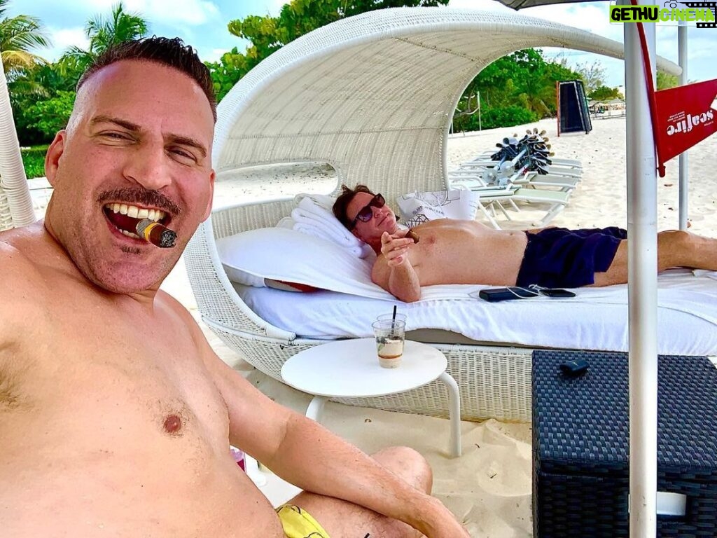 Bob Saget Instagram - Last day in Grand Cayman and the last night of shooting our movie with a wonderful cast, including this handsome devil – @therealravina - Then it’s back to reality – – Masks, second dose of vaccine, and as much stand-up as I can put out there. Will be great to make people laugh again. Grand Cayman, Cayman Islands
