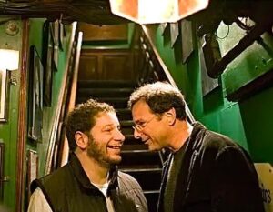 Bob Saget Instagram - To my buddy for many years, @therealjeffreyross —- Happy Birthday Jeff! Your parents are so proud of you. I only know that ‘cause my parents told me. They’ve been hangin’ out in the afterlife and the only thing they miss here are us and a good pastrami sandwich. Here’s to many more pastrami sandwiches and regular cardiologist appointments. Love you my friend. ❤️🇺🇸🎉