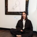 Booboo Stewart Instagram - Sitting with one of my favorite drawings and wearing one of my favorite suits by @lanefortyfive ,, great company great suits 🦅 . 📷 @stardustfallout