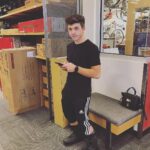 Bradley Steven Perry Instagram - When you're getting fitted for snowboarding boots but the group chat is lit @ Mom's Purse in back