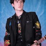 Brandon Calvillo Instagram - I paid a robot to make me look I was in the 90’s but ended up looking like the average fan of The 1975.