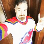 Brian Quinn Instagram - Opened a package to find that my friends at the @njdevils gifted me this funky, sweet Reverse Retro hockey jersey. I’m going to be wearing this at a game very soon. LET’S GO DEVILS! @nhl Thank you to @adidashockey for making this one.