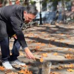 Brian Quinn Instagram - Word about me and my pocket full of peanuts is spreading through the New York City squirrel population. Here is me greeting a new friend in Tompkins Square Park. Photo by @jessicafrickerr