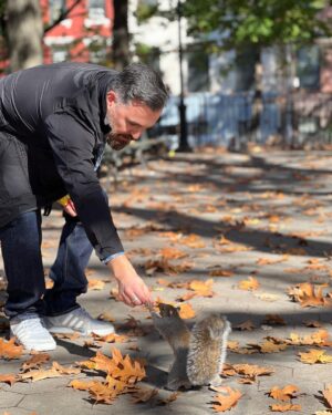 Brian Quinn Instagram - Word about me and my pocket full of peanuts is spreading through the New York City squirrel population. 

Here is me greeting a new friend in Tompkins Square Park. 

Photo by @jessicafrickerr