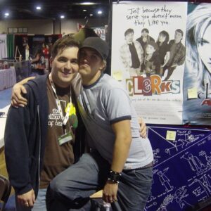 Brian Quinn Instagram - Here is a picture from 2002 of me and @jaymewes at a comic con in Dallas.  He was signing at the View Askew booth with @thatkevinsmith and I was manning the merch.  Mere children. 
Why am I posting this?  Because I love those guys and because you can watch Clerks 3 on VOD now.  Plus I have a cameo in it.  Spoiler.  #clerks3 @clerksmovie