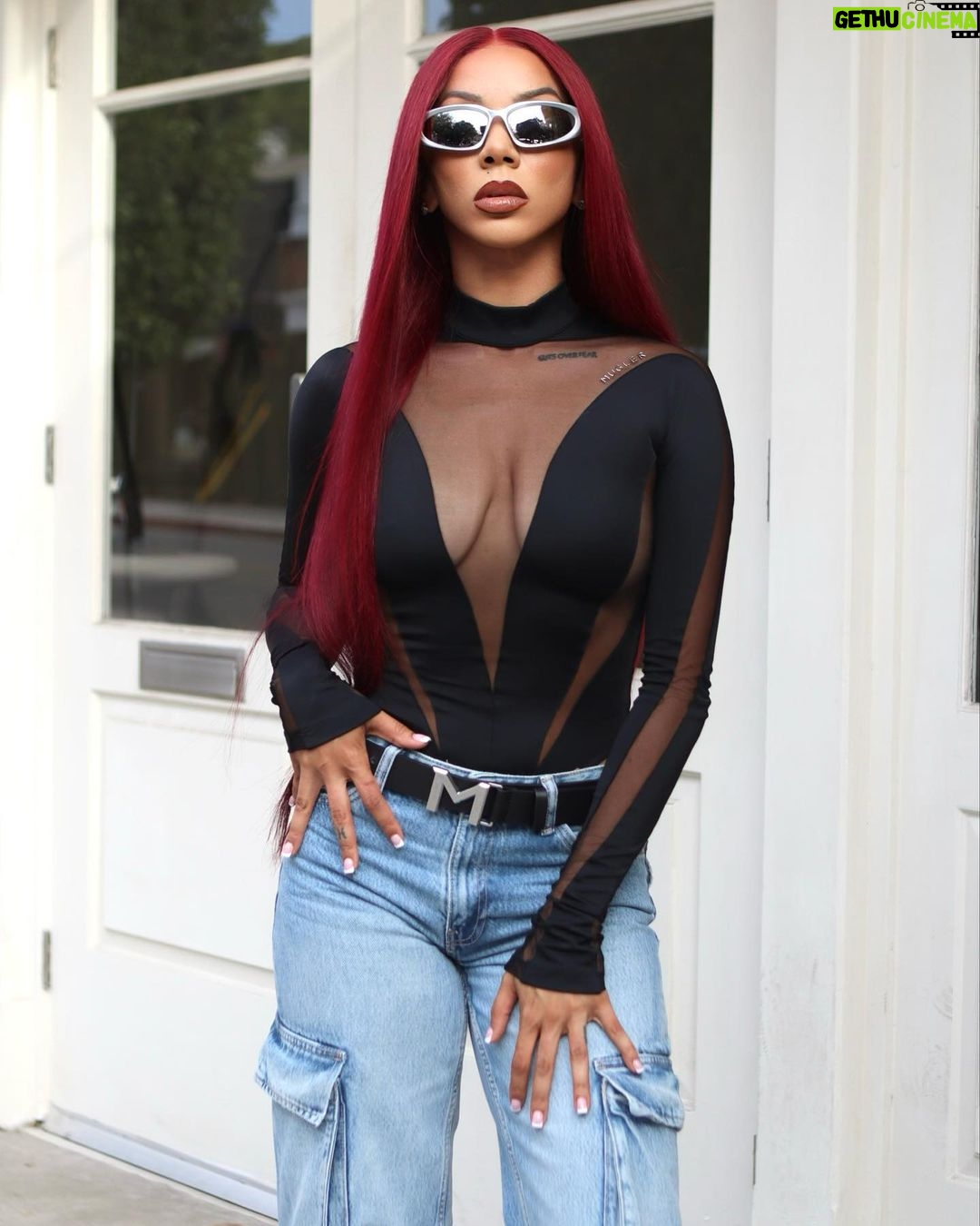 Brittany Renner Instagram - "Typical Tuesday" • Photographer: @Pyradyseeffect Stylist: @stylesbyhoward Top: @muglerofficial Pants: @zara Belt: @muglerofficial Shoes: @stevemadden Hair: @sha_villz @__haironthevillz__ Los Angeles, California