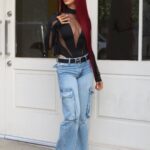 Brittany Renner Instagram - "Typical Tuesday" • Photographer: @Pyradyseeffect Stylist: @stylesbyhoward Top: @muglerofficial Pants: @zara Belt: @muglerofficial Shoes: @stevemadden Hair: @sha_villz @__haironthevillz__ Los Angeles, California
