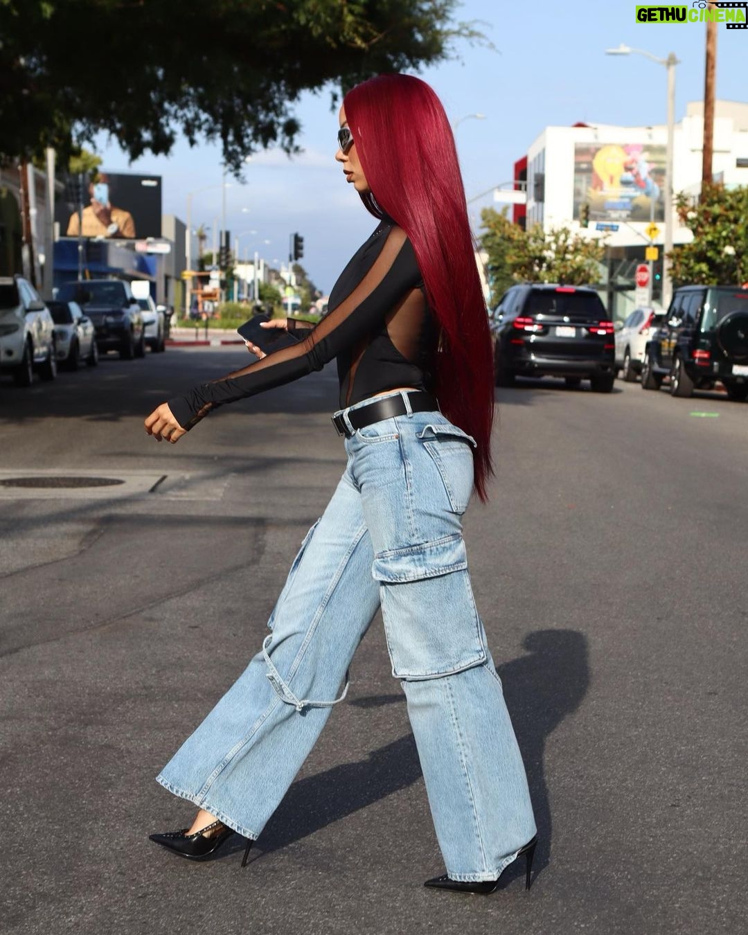 Brittany Renner Instagram - "Typical Tuesday" • Photographer: @Pyradyseeffect Stylist: @stylesbyhoward Top: @muglerofficial Pants: @zara Belt: @muglerofficial Shoes: @stevemadden Hair: @sha_villz @__haironthevillz__ Los Angeles, California
