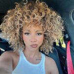 Brittany Renner Instagram - When you shine light on the shadows, they disappear. The glow is spiritual 🦁🌻🌞 Color: @shrinkage.city Haircut: @gabbys.way