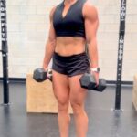 Brooke Ence Instagram - Add this tri-set to your next booty day. Go as heavy as you can to really challenge yourself! This is an example of a few exercises you’ll find in our At-Home Dumbbell Program. 1a. DB Cyclist Squat - 20/15/12 1b. DB Cossack Squat - 3x12 each  1c. Weighted Hamstring Walks - 3x6 Rest 90 sec