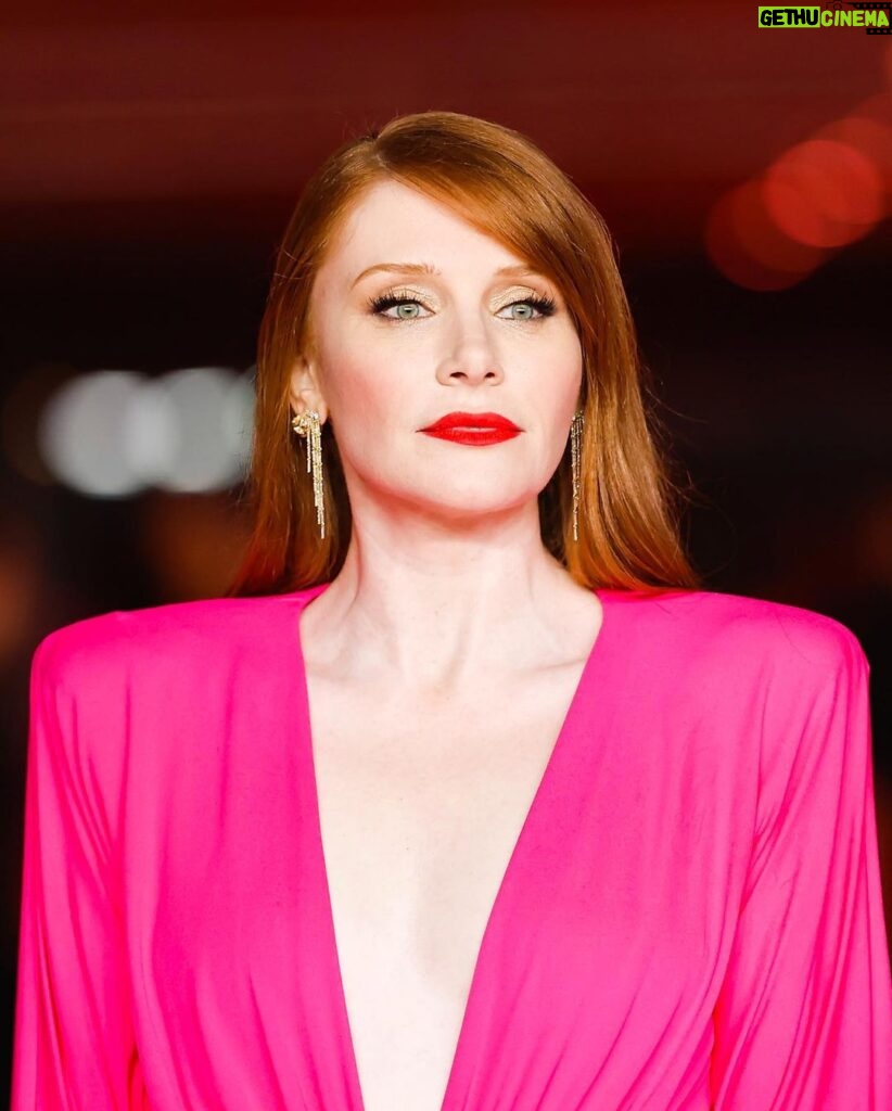 Bryce Dallas Howard Instagram - Thank you @academymuseum! 💕🦩 #AcademyMuseumGala ⁣ ⁣ Hair: @misterjasonlow⁣ Makeup: @vivianbaker⁣ Nails: @chuenails⁣ Styled by Publicist Extraordinaire: @alex.schack⁣ Dress: @alexandrevauthier⁣ Shoes: @jimmychoo Jewelry: @shycreationfinejewelry⁣ ⁣ 📸: 1-4: @andiejjane 📸 5-6: @academymuseum/ @gettyimages ⁣ [ID: Standing on the red carpet at the Academy Museum, BDH smiles and wears a fuscia dress and red shoes.] Academy Museum of Motion Pictures