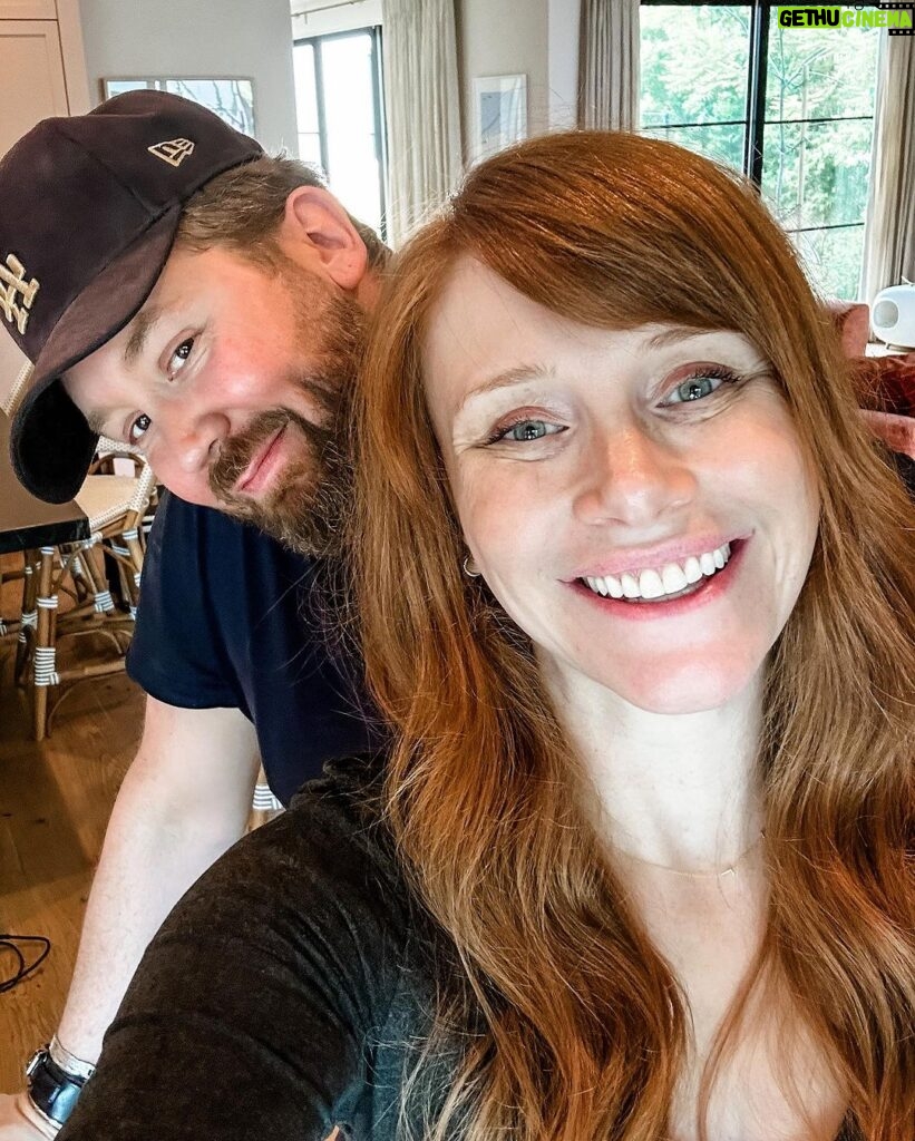 Bryce Dallas Howard Instagram - For those of you following recent bang developments (thank you for your thoughts and prayers 🙏), my bangs are officially tamed! 😅 @misterjasonlow mercifully swung by to work his magic when he was in my neighborhood. ⁣ ⁣ [ID 1: A selfie of BDH in her dino-wallpapered bedroom. She smiles in celebration of her freshly cut side bangs.]⁣ ⁣ [ID 2: A post-haircut selfie with BDH (right) and the man behind the transformation, Jason Low (left).]