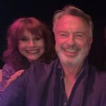 Bryce Dallas Howard Instagram – Call me DJ 100 😎 I’m absolutely honored to be the 100th DJ on the Two Paddocks Day-Glo Disco with @samneilltheprop!! You can listen to my Top 10 Tunes at the link in bio 🔗⁣
⁣
Not gonna lie, narrowing down to a list of 10 sent me onto an existential spiral. My remedy (other than avoid the assignment) was to pick favorite songs from different times in my life. Whenever one of these songs plays, it always brings up fond memories — from my wedding song (Amélie soundtrack) to my first feature as a producer (@sufjan’s “Concerning the UFO sighting…”), to my favorite musician from high school (@benleemusic)! ⁣
⁣
Take a trip down memory lane with me and click on that link in my bio — I hope these songs bring a smile to your face:)⁣
⁣
[ID: In pink lighting, BDH peeks over Sam Neill’s right shoulder for a smiling selfie.]