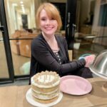 Bryce Dallas Howard Instagram – Thank you all for the birthday messages 🫶🏻 I wish I had the words to express how grateful I am for the outpouring of love and support as I enter my 42nd year!! You all were the bright spot in my day — what a special way to start this year ☺️⁣
⁣
[ID: Outside on the patio, BDH smiles, absolutely excited to celebrate with a delicious gluten-free vanilla rainbow birthday cake.]