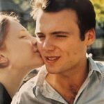 Bryce Dallas Howard Instagram – Celebrated 22 years together yesterday. We didn’t make plans and I’ve gotta say, it was our best anniversary yet. We reminisced, we took a walk, we watched episodes of our favorite show from the earliest days of our relationship (“Nigella Bites”). Late in the evening, before we each gave the other permission to do the thing we wanted to do (for me watercolor; for him play video games), we talked about the dreams we held for next 22 years (if we should be blessed enough) and it was kinda wild and amazing to imagine the possibilities. I love you Seth Gabel — thanks for going on that date 22 years ago. I still own the sweater I wore that night because I JUST KNEW.⁣
⁣
Happy Anniversary ⁣
⁣
[ID: A close up of BDH (left) and Seth (right) from their college years. BDH kisses Seth on the cheek and Seth smiles]