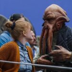 Bryce Dallas Howard Instagram – Reunited. And it feels SO GOOD! It’s an honor to have been invited back to direct on the new season of #TheMandalorian — there’s nothing quite like the adventure, magic, and friendships forged on this show 🥹 Swipe to watch the trailer for season three and mark your calendars for the premiere on March 1, only on #DisneyPlus 💫⁣⁣⁣
⁣⁣⁣
[ID: BDH in various states of glee on the Season 2 set of The Mandalorian: casually hanging out with a Quarren on giant trawler, talking to the iconic Frog Couple on the docks of Trask, and watching the monitor at video village.]