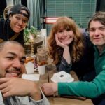 Bryce Dallas Howard Instagram – Burgers and fries, the perfect candlelight dinner 😋⁣
⁣
[ID: Clockwise from left: Alano, Nia, Bryce, and Seth are all smiles (and silly faces), celebrating the weekend with a group dinner outside on a patio.]