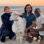 Bryce Dallas Howard Instagram - Life gets bigger when you break from the herd 🐑 #ad directed by yours truly 🤍 @vw ⁣ ⁣ Starring the wonderful Clint Keller (@actuallyclint), Eric Emmanuel, and Tina Joy, alongside our hero sheep: Bailey, Bertha, and Bessie⁣ ⁣ [ID: On the sands of Will Rogers State Beach at sunset, BDH and the cast of the “Break Free” VW ad take a photo with Bailey the Sheep]