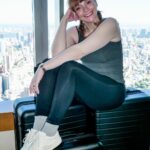 Bryce Dallas Howard Instagram - @away suitcases = press travel essentials. Thank you for making my travels as easy (and glamorous) as can be ❤️ Not an ad, just super grateful ☺️⁣ ⁣ [ID: In a hotel room getting ready for her flight, BDH sits on top of her gifted Away black Flex suitcases.]