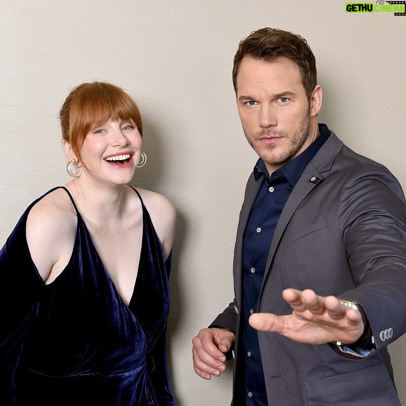 Bryce Dallas Howard Instagram - Favorite thing #6718 about @prattprattpratt: I can rely on him for a belly laugh as much as I can for incredibly insightful advice. It’s why I loved having him speak with my students in the #NineMusesLab about making a mark as an artist — you can listen to his invaluable advice at the link in bio 🔊⁣ ⁣ Repost @ninemusesentertainment: “Understand what makes you an outsider... [and] hold onto it because it’s a point of view that will become increasingly rare the longer you spend time in any kind of system of art or industry emerging.” — Chris Pratt (@prattprattpratt)⁣ ⁣ Questions about making work as a multi-hyphenate artist warrant many perspectives — and this is where you’ll find a few. Welcome to “Ask A Muse.”⁣⁣⁣⁣ ⁣⁣⁣⁣ This Week’s Muse: Chris Pratt⁣ This Week’s Question: What advice would you give to emerging artists today? ⁣⁣⁣⁣ ⁣⁣⁣⁣ Listen to Chris’ full response at the link in bio ☝️⁣ ⁣⁣ 📸: Kazuhiko Okuno & @aspictures⁣ #NineMuses #TheMuse #BryceDallasHoward #ChrisPratt #JurassicWorldDominion⁣ ⁣ [ID: BDH laughs while Chris strikes his famous raptor pose]