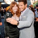 Bryce Dallas Howard Instagram - Big smiles for the birthday boy 😁 @prattprattpratt, over the last three movies and eight years together, we’ve become like family and that alone is a reason to celebrate. ⁣ ⁣ I remember celebrating your 35th birthday in New Orleans near the end of filming the first movie and it is remarkable how much has changed in all that time — but not you my friend. You were the same then as you are now: a big fella with a heart of gold and shit-ton of talent, work-ethic, smarts, humility, and above all FAITH. You are a heck of a family man, a stellar friend, and the ultimate teammate. I have loved being in the Jurassic trenches with you, Chris. ⁣⁣ ⁣⁣ You are sincerely one of the most thoughtful, kind-hearted, resilient, ethical, compassionate, brilliant, creative, sensitive, and open-minded human beings I’ve ever had the pleasure of encountering. You are the shot of adrenaline, optimism, and side-stitching humor I now miss whenever we aren’t in the same room. Thanks for all the laughs, deep lunges, pep-talks, and team spirit — Chris Pratt, I adore you. You are one of the greats 😊 Happy happy birthday!! 🎉✨⁣⁣ ⁣⁣ [ID: The Setup vs. The Shot: Jurassic World Dominion edition. BDH & Chris take a selfie together at the LA Premiere of the movie — the first photo is of the duo taking the selfie and the second photo is the selfie]