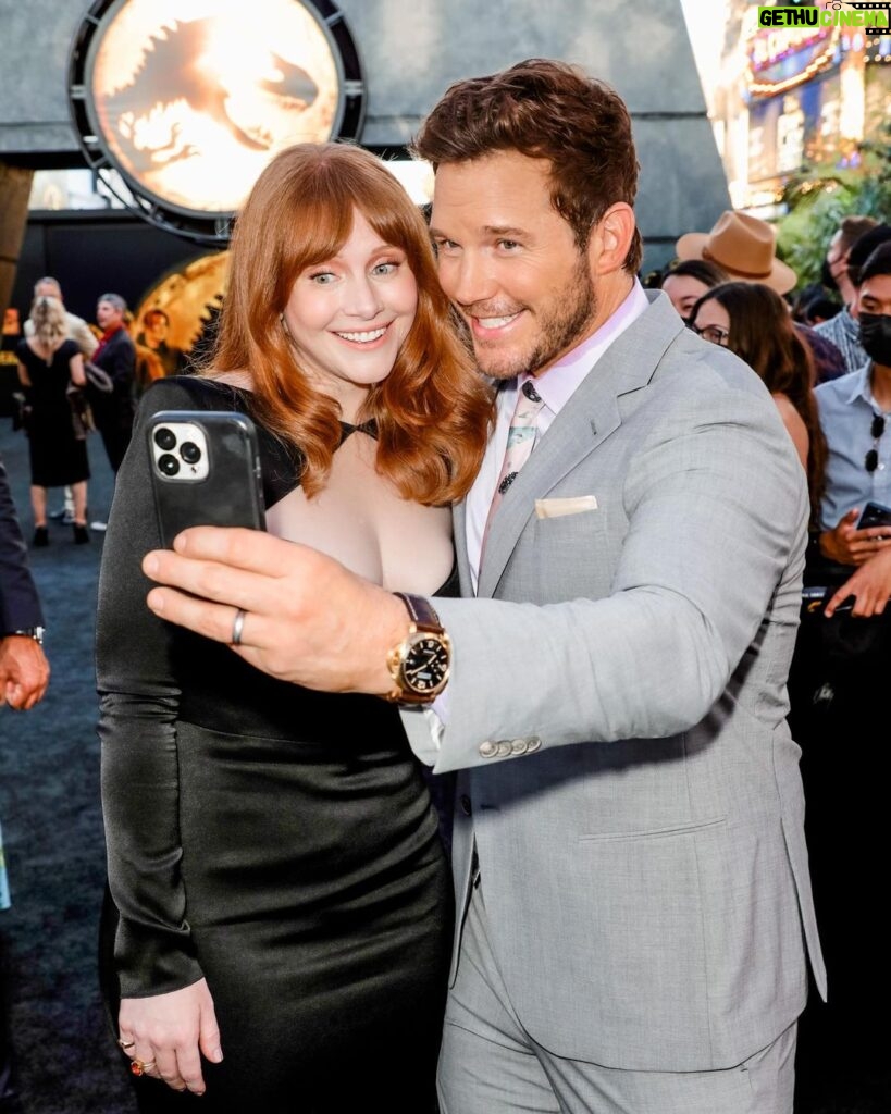 Bryce Dallas Howard Instagram - Big smiles for the birthday boy 😁 @prattprattpratt, over the last three movies and eight years together, we’ve become like family and that alone is a reason to celebrate. ⁣ ⁣ I remember celebrating your 35th birthday in New Orleans near the end of filming the first movie and it is remarkable how much has changed in all that time — but not you my friend. You were the same then as you are now: a big fella with a heart of gold and shit-ton of talent, work-ethic, smarts, humility, and above all FAITH. You are a heck of a family man, a stellar friend, and the ultimate teammate. I have loved being in the Jurassic trenches with you, Chris. ⁣⁣ ⁣⁣ You are sincerely one of the most thoughtful, kind-hearted, resilient, ethical, compassionate, brilliant, creative, sensitive, and open-minded human beings I’ve ever had the pleasure of encountering. You are the shot of adrenaline, optimism, and side-stitching humor I now miss whenever we aren’t in the same room. Thanks for all the laughs, deep lunges, pep-talks, and team spirit — Chris Pratt, I adore you. You are one of the greats 😊 Happy happy birthday!! 🎉✨⁣⁣ ⁣⁣ [ID: The Setup vs. The Shot: Jurassic World Dominion edition. BDH & Chris take a selfie together at the LA Premiere of the movie — the first photo is of the duo taking the selfie and the second photo is the selfie]