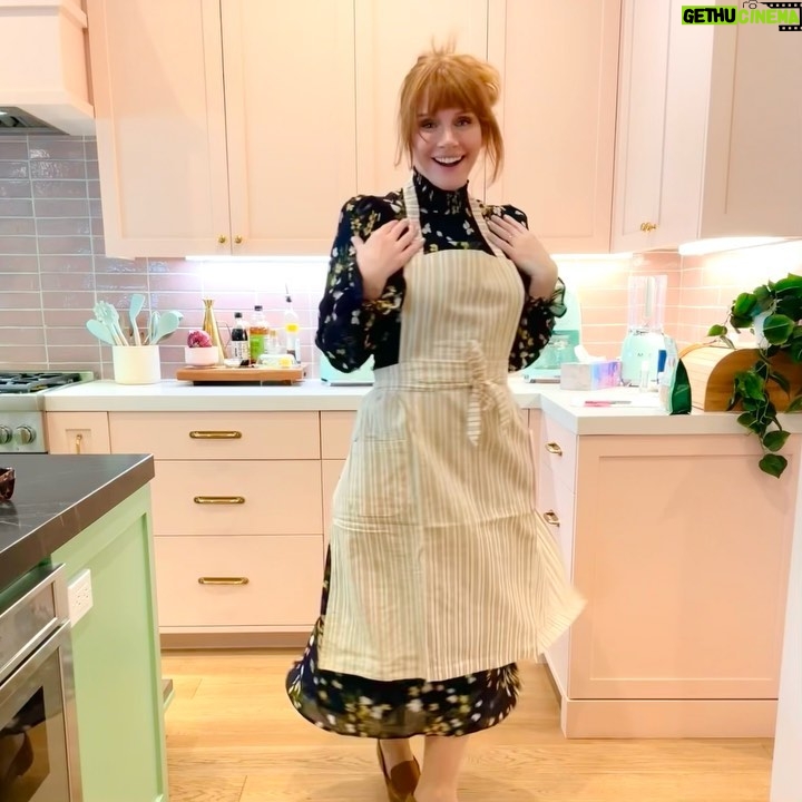 Bryce Dallas Howard Instagram - Thank you @sweetlaurelbakery for the delicious treats 💖 I never knew how soothing cake decorating could be… and next time I’ll start my design with the end in mind 😅 I hope The Great British Bake Off would be proud.⁣⁣ ⁣⁣ @laurelgallucci and @clairethomas, it’s always a joy to hang out with you and I can’t wait for Sweet Laurel to grace the shelves of our grocery stores soon! ⁣⁣ ⁣⁣ [ID 1: Living her cottage-core dreams, BDH stands between Laurel Gallucci and Claire Thomas (co-founders of Sweet Laurel Bakery) in a picturesque garden. They each hold a chocolate cake decorated with roses and raspberries.]⁣⁣ ⁣⁣ [ID 2-3: BDH twirls and shows off her new Sweet Laurel apron and canvas tote.]⁣⁣ ⁣⁣ [ID 4: A stack of Sweet Laurel Bakery’s upcoming chocolate cake, pancake, and scone mix boxes.]