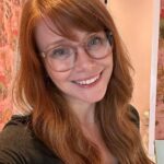 Bryce Dallas Howard Instagram - For those of you following recent bang developments (thank you for your thoughts and prayers 🙏), my bangs are officially tamed! 😅 @misterjasonlow mercifully swung by to work his magic when he was in my neighborhood. ⁣ ⁣ [ID 1: A selfie of BDH in her dino-wallpapered bedroom. She smiles in celebration of her freshly cut side bangs.]⁣ ⁣ [ID 2: A post-haircut selfie with BDH (right) and the man behind the transformation, Jason Low (left).]