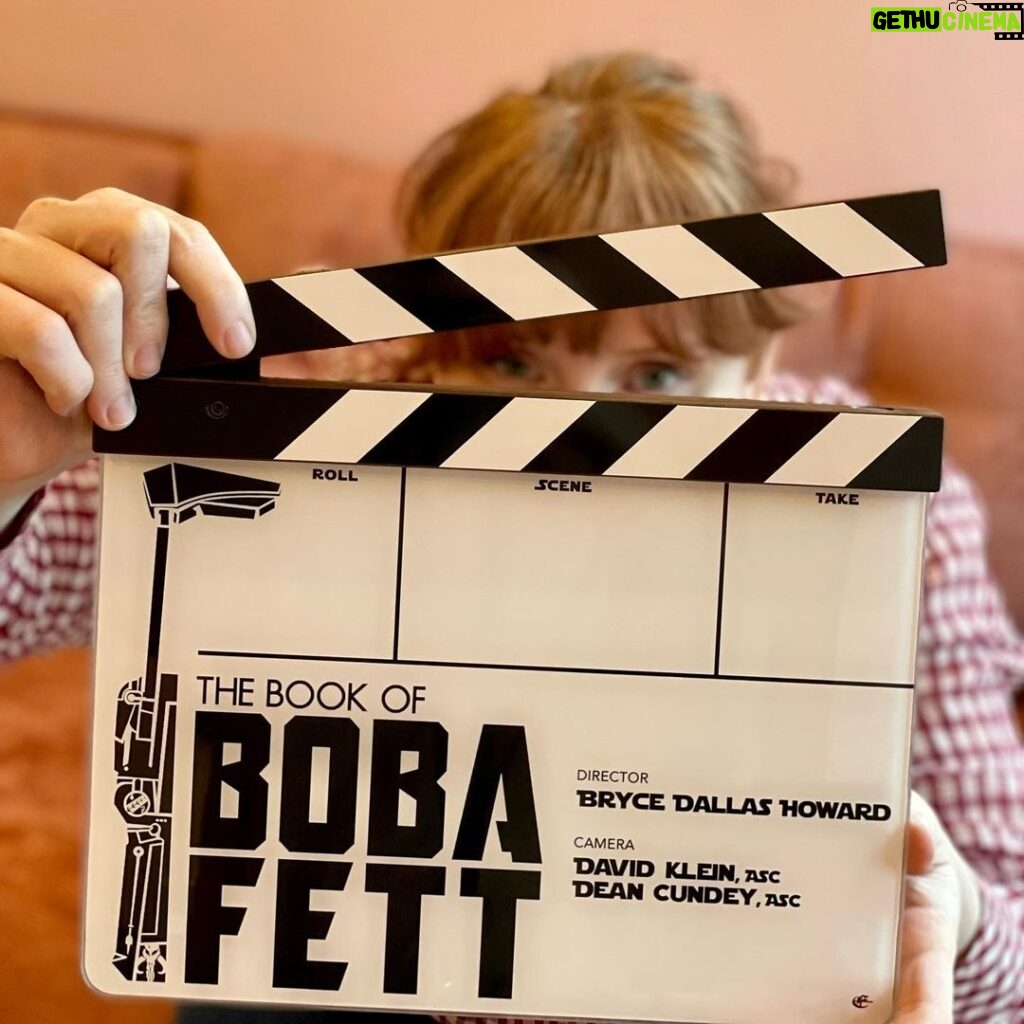 Bryce Dallas Howard Instagram - Happy Boba Day 💚 ⁣ #TheBookofBobaFett #StarWars #LoveMyJob ⁣ ⁣ [ID 1: a very excited bdh holding a slate for “The Book of Boba Fett,” a gift from the immensely talented cinematographer @davekleinasc]⁣ ⁣ [ID 2: a black title card with text in green that reads, “Directed by Bryce Dallas Howard.”]