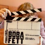 Bryce Dallas Howard Instagram - Happy Boba Day 💚 ⁣ #TheBookofBobaFett #StarWars #LoveMyJob ⁣ ⁣ [ID 1: a very excited bdh holding a slate for “The Book of Boba Fett,” a gift from the immensely talented cinematographer @davekleinasc]⁣ ⁣ [ID 2: a black title card with text in green that reads, “Directed by Bryce Dallas Howard.”]