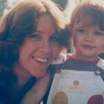 Bryce Dallas Howard Instagram - Mama, what a life you’ve made for our entire family. Thank you for never following the trends, for not giving a crap what others thought of you, and for being such a courageous, groundbreaking, and deeply ethical human. Your intelligence, imagination, and love for your constantly growing human and fur family is awe-inspiring. Happy birthday Ama-Mama we love you ❤️⁣ ⁣ [ID: A photo from 1983 of Cheryl Howard (left) in a blue shirt next to me at 2 years old (right) wearing white and polka dot overalls and a purple shirt. Both of us are smiling :) ]