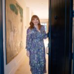 Bryce Dallas Howard Instagram - There are two things I need you to know about my home: (1) this is where the magic happens 😉 and (2) the design is a love affair between every franchise I treasure and have worked in. ⁣ ⁣ I am so so grateful to the exceptionally creative @clairethomas for designing our new home and bringing her love and expertise of production design to every inch of the space — the colors, textures, prints, good vibes, everything! My family and I are living in a retro-futurist dream come true and it’s thanks to Claire and her incredible vision and team 💖💛⁣ ⁣ You can take a full @archdigest tour of this fangirl’s paradise at the link in bio 🏠⁣ ⁣ Photographer: @timhirschmann⁣ Interior Styling: @emilyvallely⁣ Interior design: @clairethomas⁣ Writer: @lauramaytodd⁣ ⁣ [ID 1: BDH lounges on her pink, cloud-like chaise from @luluandgeorgia next to her favorite vintage flamingo lamp. It’s a redhead oasis ✨]⁣ ⁣ [ID 3: BDH leans on the shoulder of @stealthgabel in their Miyazaki dining room, the @schumacher1889 forest wallpaper reminding them of “My Neighbor Totoro”]⁣ ⁣ [ID 4: BDH and glowing designer @clairethomas stand in the home’s kitchen. The morning light highlights the pinkish hue of the Antelope Canyon @fireclaytile and @portolapaints Sparks limewash wall paint]