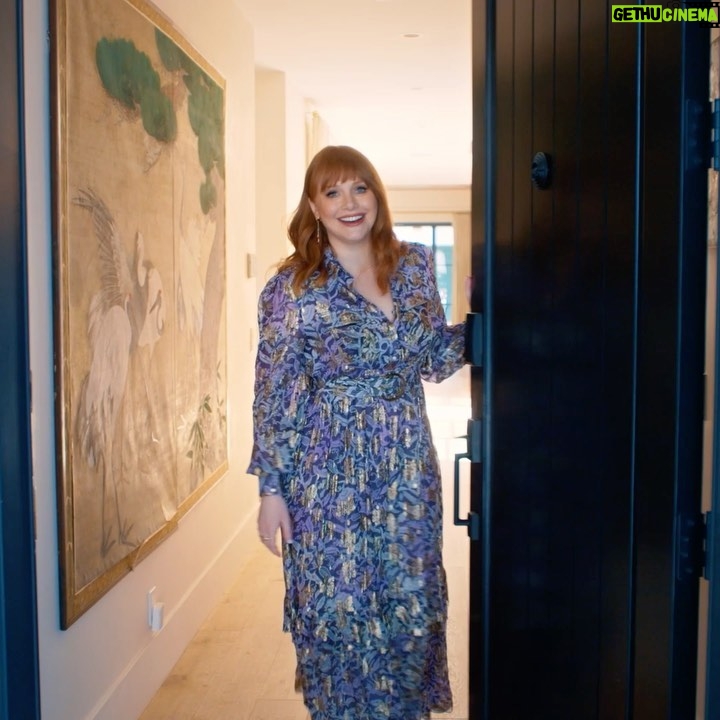 Bryce Dallas Howard Instagram - There are two things I need you to know about my home: (1) this is where the magic happens 😉 and (2) the design is a love affair between every franchise I treasure and have worked in. ⁣ ⁣ I am so so grateful to the exceptionally creative @clairethomas for designing our new home and bringing her love and expertise of production design to every inch of the space — the colors, textures, prints, good vibes, everything! My family and I are living in a retro-futurist dream come true and it’s thanks to Claire and her incredible vision and team 💖💛⁣ ⁣ You can take a full @archdigest tour of this fangirl’s paradise at the link in bio 🏠⁣ ⁣ Photographer: @timhirschmann⁣ Interior Styling: @emilyvallely⁣ Interior design: @clairethomas⁣ Writer: @lauramaytodd⁣ ⁣ [ID 1: BDH lounges on her pink, cloud-like chaise from @luluandgeorgia next to her favorite vintage flamingo lamp. It’s a redhead oasis ✨]⁣ ⁣ [ID 3: BDH leans on the shoulder of @stealthgabel in their Miyazaki dining room, the @schumacher1889 forest wallpaper reminding them of “My Neighbor Totoro”]⁣ ⁣ [ID 4: BDH and glowing designer @clairethomas stand in the home’s kitchen. The morning light highlights the pinkish hue of the Antelope Canyon @fireclaytile and @portolapaints Sparks limewash wall paint]