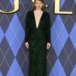 Bryce Dallas Howard Instagram - London, you make my heart so full! ❤️ #ArgylleMoviePremiere⁣ ⁣⁣ 📸: Getty Images for Universal Pictures Hair: @cwoodhair⁣⁣ Makeup: @karayoshimotobua⁣⁣ Styled by Publicist Extraordinaire: @alex.schack⁣⁣ ⁣⁣ [ID: In front of blue and yellow Argylle-themed backdrops, BDH poses for photos at the UK premiere of #ArgylleMovie. She wears a long, glittering emerald green dress with a deep v-neckline and deep crimson lipstick. Her straightened hair falls behind her back to show off her earrings.] Odeon Luxe Leicester Square