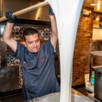 Buddy Valastro Instagram - When you’ve got the best cheese pull in Vegas! #bosscafe #buddyvalastro #vegas #thelinq #lasvegasstrip #fresh #freshmozzarella #madeinhouse #madedaily #cheesemaking #cheesepull