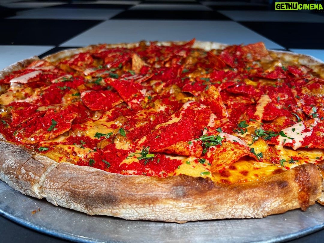 Buddy Valastro Instagram - Excessive Heat Warning!! We know it’s hella hot outside, but we want to make it even hotter with our Flaming Hot Pie. Lots of spice, buffalo sauce, Flamin’ Hot Doritos AND Flamin’ Hot Cheeto dust. #pizzacake #buddyvalastro #flaminhot #flaminghot #pizza #heatwave #excessiveheatwarning #bringtheheat #harrahs #vegas #vegasstrip Harrah's Las Vegas