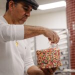 Buddy Valastro Instagram - The perfect way to celebrate the end of the week #SprinkleSpectacular #rainbowcake #carlosbakery