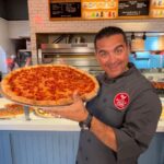 Buddy Valastro Instagram - With a pizza like this, it’s all smiles! #pizzacake #buddyvalastro #pizza #pepperonipizza #harrahs #harrahsvegas #harrahsneworleans #vegas #neworleans