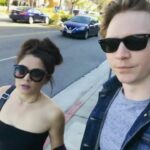 Calum Worthy Instagram - This video sums up our relationship. We met while I was filming one of the last episodes of Austin and Ally. I was about to film a scene and I was wearing booty shorts and had spiked hair, while @thecelestadeastis was looking beautiful and perfect (like always). I tried to play it cool but I literally tripped and fell when I first saw her. I have never been more nervous than when I walked over to say “Hi”. I knew it was a moment that would change my life - and it did! I still can’t believe she said yes to going on a date. I’m smiling just thinking about it. She made me understand love songs. I feel like the kid in Love Actually. We’re like Rose and Jack from Titanic - if Jack was a dorky pale ginger and they had decided to not go on that cruise ship. We’re a thousand miles away right now but just know there is an awkward Canadian in the shade trying avoid a sunburn who is crazy about you. Happy Anniversary @thecelestadeastis. I love you ❤️