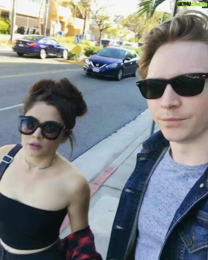 Calum Worthy Instagram - This video sums up our relationship. We met while I was filming one of the last episodes of Austin and Ally. I was about to film a scene and I was wearing booty shorts and had spiked hair, while @thecelestadeastis was looking beautiful and perfect (like always). I tried to play it cool but I literally tripped and fell when I first saw her. I have never been more nervous than when I walked over to say “Hi”. I knew it was a moment that would change my life - and it did! I still can’t believe she said yes to going on a date. I’m smiling just thinking about it. She made me understand love songs. I feel like the kid in Love Actually. We’re like Rose and Jack from Titanic - if Jack was a dorky pale ginger and they had decided to not go on that cruise ship. We’re a thousand miles away right now but just know there is an awkward Canadian in the shade trying avoid a sunburn who is crazy about you. Happy Anniversary @thecelestadeastis. I love you ❤️